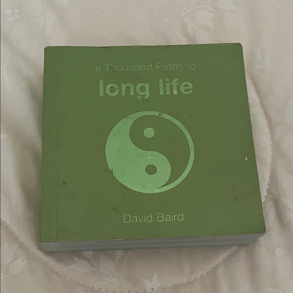 Green Book with Yin Yang Symbol